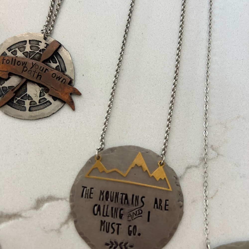 Metal “Mountains Are Calling” Pendant Necklace by artisan So Beautifully Broken